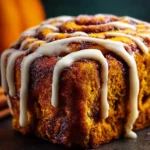 Cinnamon Roll Pumpkin Bread with Cream Cheese Glaze First Image